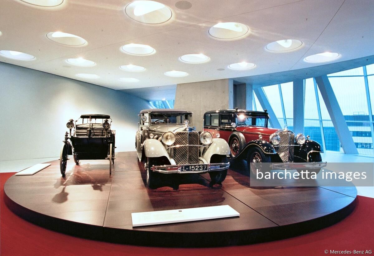 The Mercedes-Benz Museum, Stuttgart, is showing two of the Mercedes-Benz 770 "Grand Mercedes" (model series W 07, 1930 to 1938) from famous previous owners in Collection 4 –"Gallery of Celebrities". In the middle is the Cabriolet F (built in 1932) belonging to the German Emperor, Kaiser Wilhelm II. On the right is the armoured Pullman limousine (built in 1935) belonging to the Japanese Emperor Hirohito. On the left is a Daimler motor car from 1892, originally owned by Moulay Hassan I, Sultan of Morocco from 1873 to 1894. 