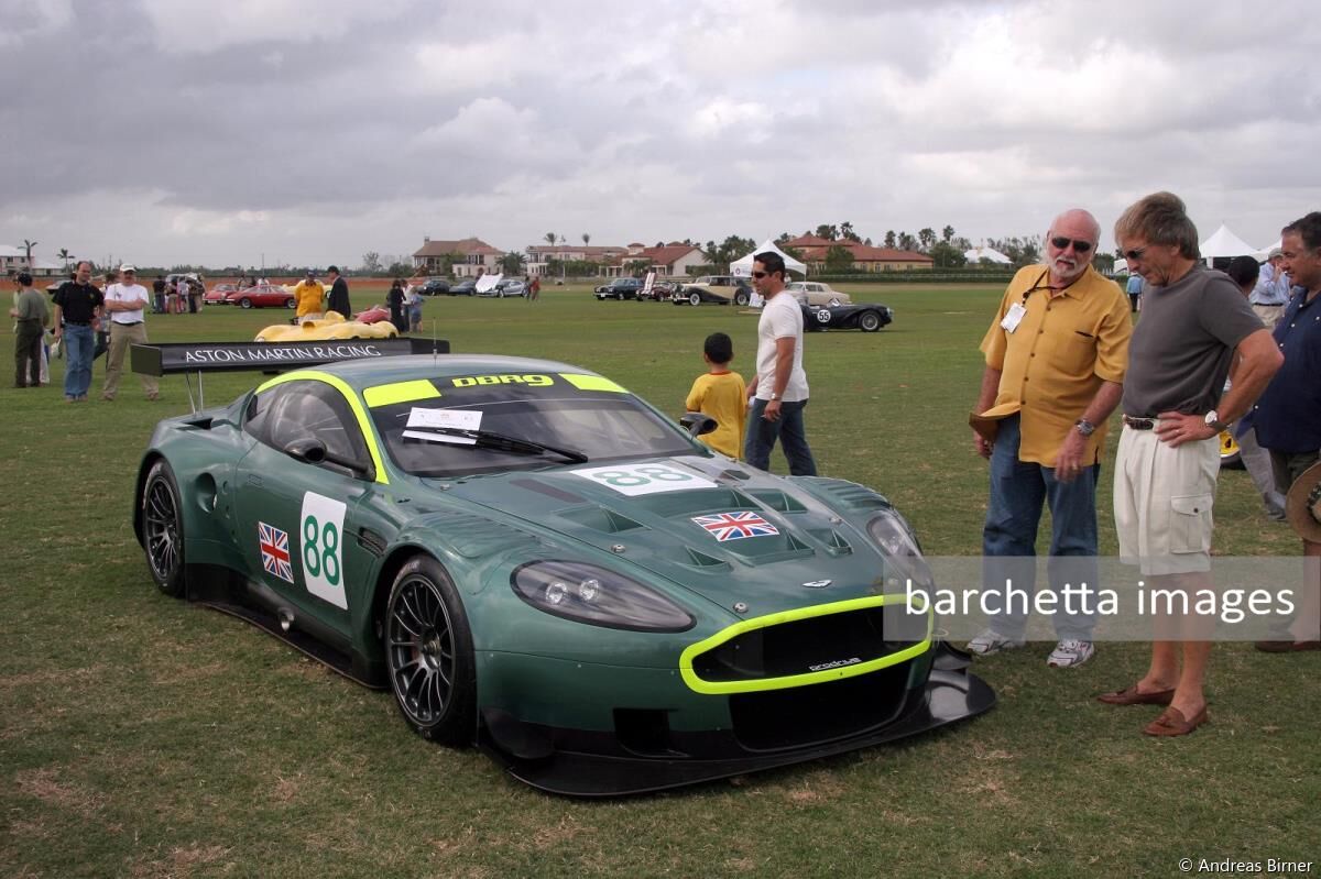 Michael Fux & Derek Bell standing at Mr. Fux' Aston Martin DBR9 #DBR9/05