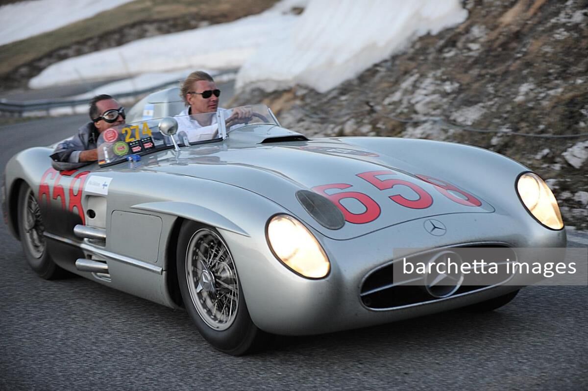Mille Miglia 2011, Mika Häkkinen and Juan Manuel Fangio II., Mercedes-Benz 300 SLR (W 196 R series). In 1955, Juan Manuel Fangio came on second place in the Mille Miglia in an identical car.