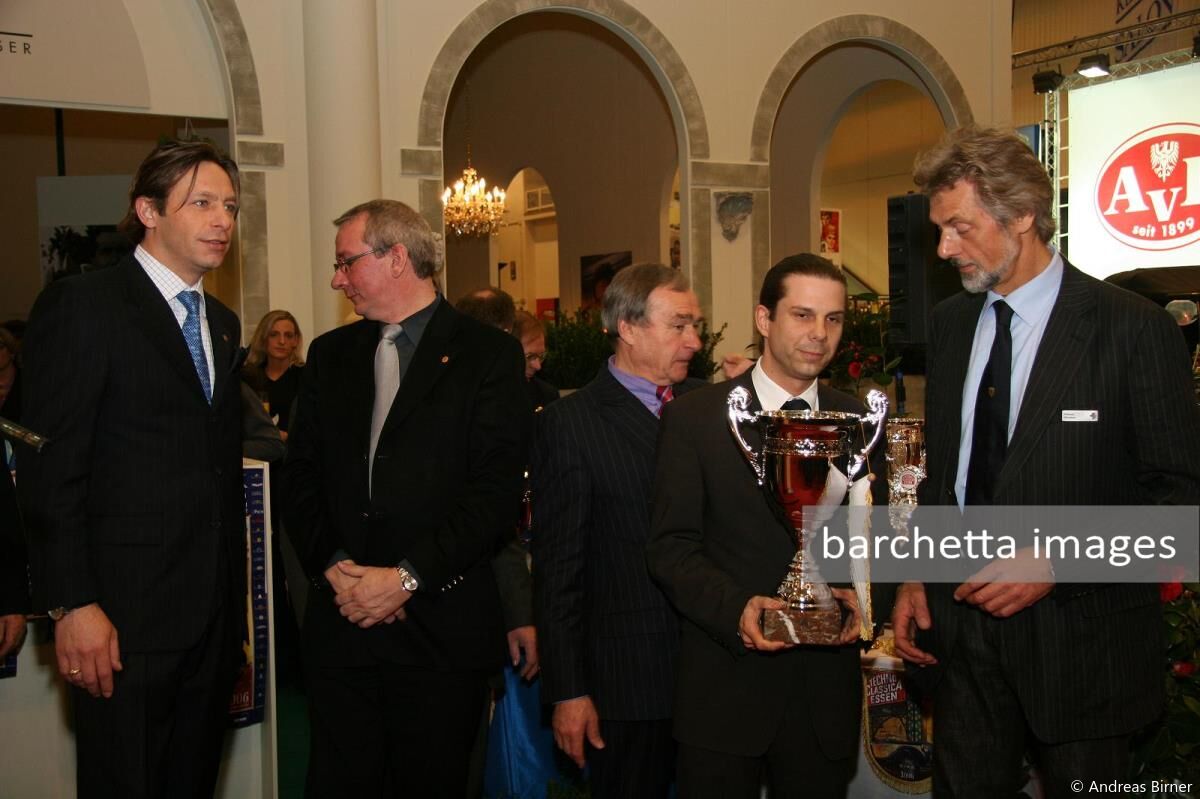 Götz Seidel & Helmut Eberlein being handed over the prize for the official Ferrari Display