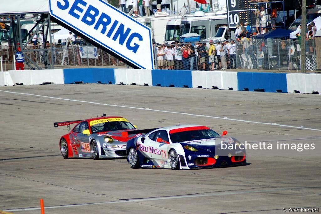 71 Dominik Farnbacher / Dirk Mueller / Robert Bell - Ferrari F430 GTC s/n 2608 and 45 Joerg Bergmeister / Wolf Henzler / Marc Lieb - Porsche 911 GT3 RSR