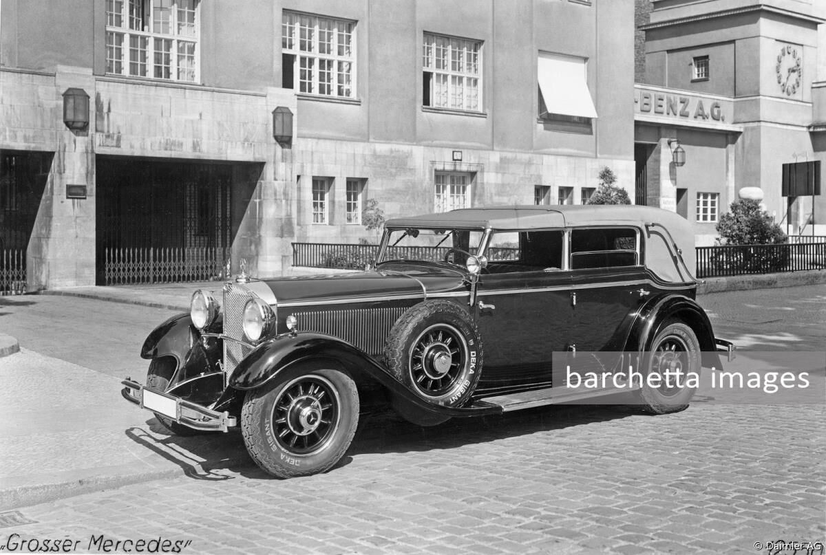 Mercedes-Benz 770 "Grand Mercedes", (model series W 07, 1930 to 1938), here as a Cabriolet D (four-seater, four-door body), as a used car in front of the Mercedes-Benz branch office in Berlin-Charlottenburg, Salzufer 2–3. The fact that this was a used car is shown, for example, by the missing Mercedes star on the rear wheel lock. This Cabriolet D was a popular body form built by the special vehicle production unit at the Sindelfingen plant. Photo from 1931. 
