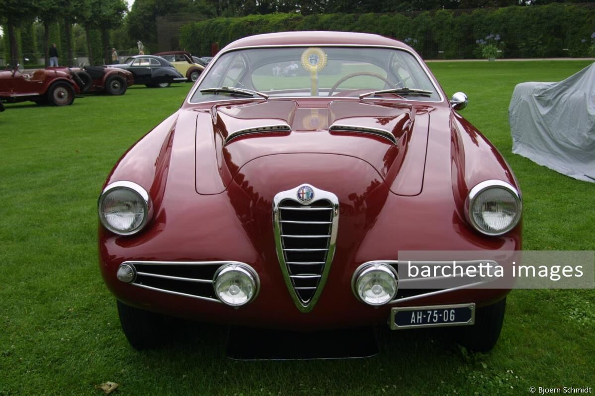 The 1955 Alfa Romeo 1900C Super Sprint Zagato Competition Berlinetta offered here is without doubt one of the finest examples of this exclusive high performance Alfa Romeo in existence.     5th August 1955 - racing cyclist Mario Binda in Milan on 5th August 1955  195. - exported to the USA where by   1961 -  J C Edwards, California.     1961/after -  engine block and cylinder head were replaced with Alfa Romeo 2000 equivalents,   196. -  Jay Jacobs   196. - Philip Musser of Pt. Richmond.   1980/late - Said Marouf   1980/late - restorered at Paolo and Nino Epifani in Berkeley (CA) ... a complete rebuild   1990 - Pebble Beach Concours d'Elegance ...  third place in its class   2001/jan - Paul Schouwenburg, NL via BROOKS     2001//? - stripped and repainted in deep Burgundy red by Fabio Calligaris in Milan   2003 - Palace Het Loo Concours   2003 - Schwetzingen European Concours   2005 - Concorso di Eleganza at Villa d'Este     Schouwenburg ......  "It currently has a 2000 Sprint/Spyder block (vintage around 1959) and head as fitted around 1960.   It was tuned and prepared by Epifani.   This is a much better engine, with the later Giulia system of valve gear.   We covered some 5,000 km over the years and never had to take it apart.   No mechanical failures, no crashes, not even a small dent or scratch.   It also comes with a period spare 1900C SS engine with carburetors and air filter as used in the Super Sprint of the mid-Fifties."