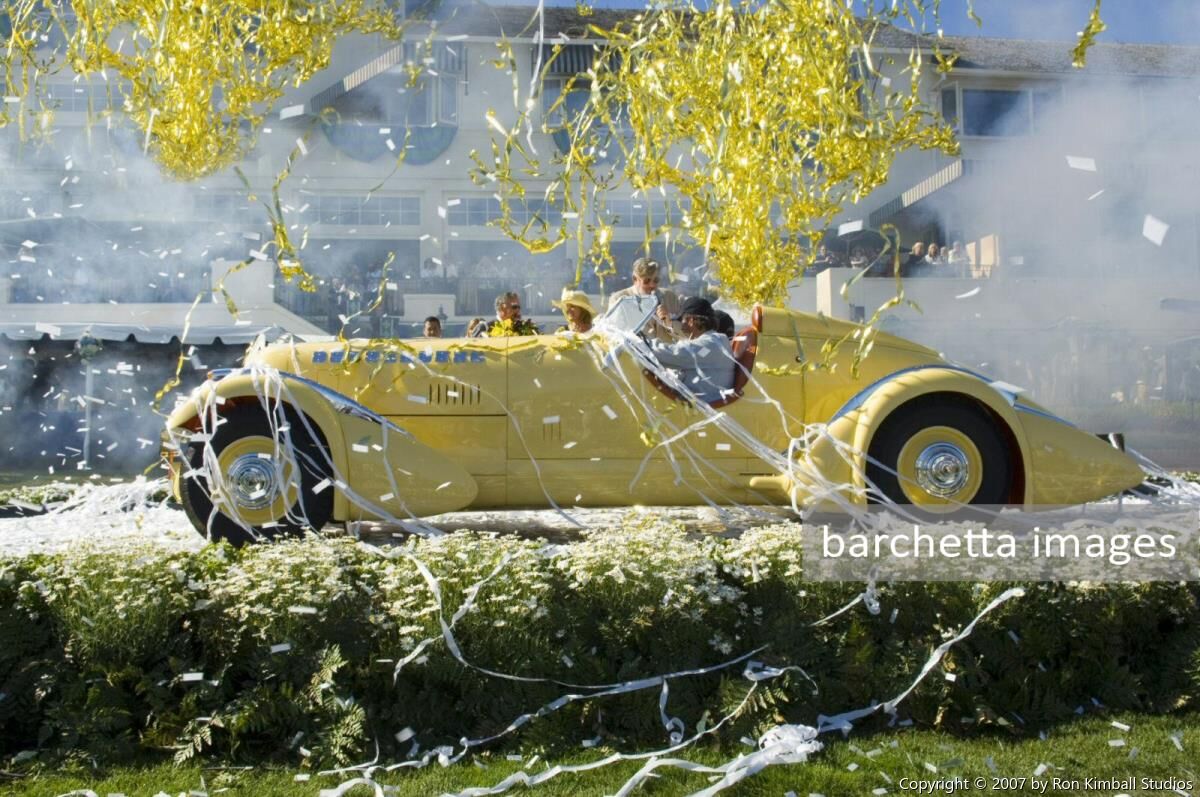 Fireworks and confetti greet the winner of the 2007 Pebble Beach Concours d'Elegance \n Harry Yeaggy from Cincinnati, Ohio with his 1935 Duesenberg SJ Special