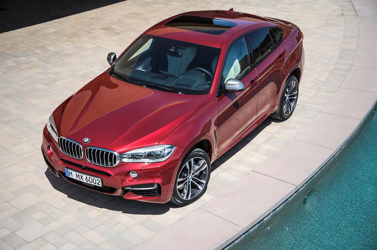 BMW X6 M50d in Flamenco Red