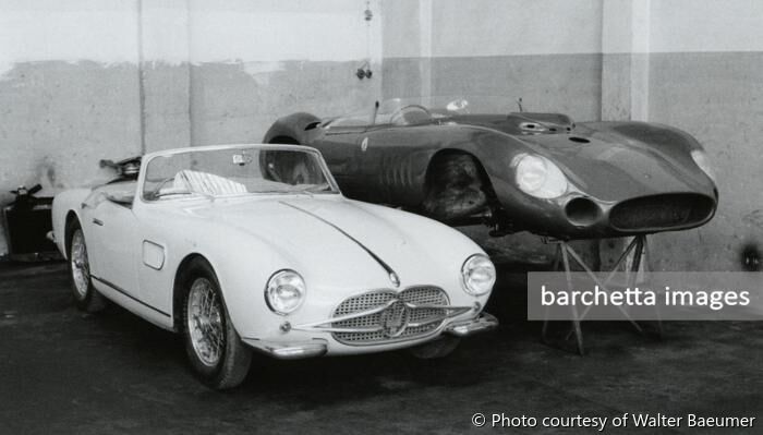 The 1957 Maserati 150 GT Spider prototype is pictured next to the body of a 300 S in the Maserati racing workshop