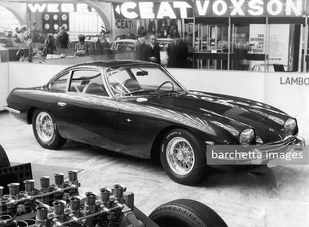  Lamborghini 350 GT in the background on Pirelli Cinturato HS tyres and in the fore ground is the first ever chassis of a Muira