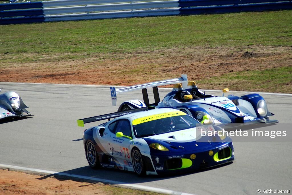 73 Allan Simonsen / Jim Tafel / Pierre Ehret - Ferrari F430 GTC s/n 2610 and 20 Butch Leitzinger / Marino Franchitti / Andy Lally - Porsche RS Spyder